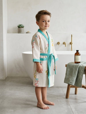Child wearing a bunny print lounger in a bathroom