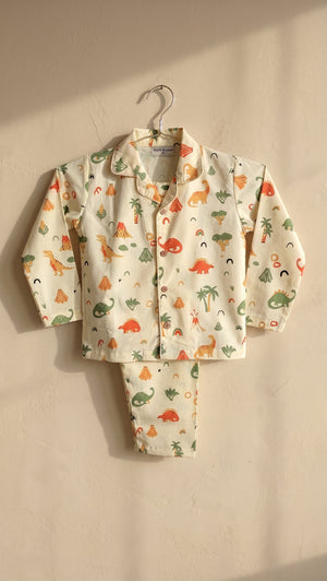 Dino print on butter yellow fabric